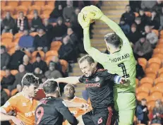  ??  ?? Lee Cattermole battles for a high ball.