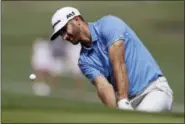  ?? ERIC GAY — THE ASSOCIATED PRESS ?? Dustin Johnson hits to the 16th green during semifinal play at the Dell Technologi­es Match Play on Sunday.