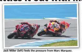  ?? ?? Jack Miller (left) feels the pressure from Marc Marquez.