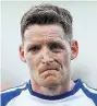  ??  ?? SORE ONE Pain is etched on Conor Mcmanus’ face