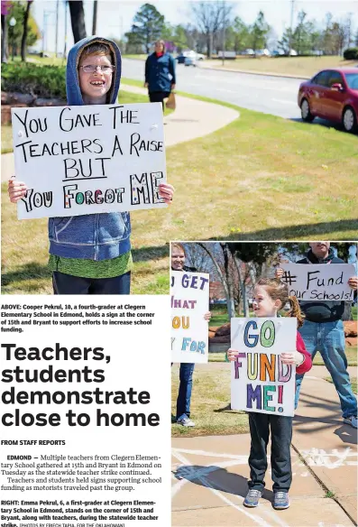  ?? [PHOTOS BY ERIECH TAPIA, FOR THE OKLAHOMAN] ?? ABOVE: Cooper Pekrul, 10, a fourth-grader at Clegern Elementary School in Edmond, holds a sign at the corner of 15th and Bryant to support efforts to increase school funding. EDMOND — RIGHT: Emma Pekrul, 6, a first-grader at Clegern Elementary School...