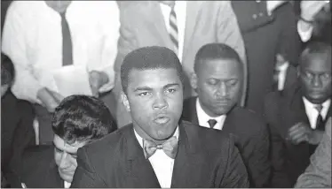  ?? ASSOCIATED PRESS FILE (1966) ?? Muhammad Ali attends a meeting of the Illinois Athletic Commission after Gov. Otto Kerner Jr. requested that the commission members reconsider permission for him to defend his boxing title that month. Ali had criticized his imminent Army draft status.
