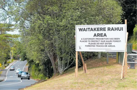  ?? Picture / Getty Images ?? Visitors are urged not to enter Waitakere Ranges park tracks or forested areas. The measure targets the spread of kauri dieback disease.