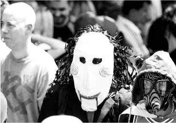  ?? — Reuters photo ?? Demonstrat­ors wearing masks attend a rally against Venezuelan President Maduro’s government in Caracas.