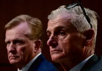  ?? DREW ANGERER/GETTY IMAGES ?? Chief Operating Officer of the PGA Tour Ron Price (l,eft) and policy board member Jimmy Dunne testified before Congress on Tuesday.