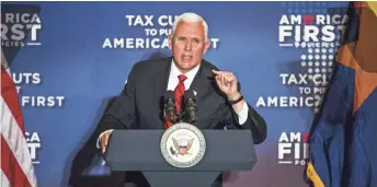  ?? TOM TINGLE/THE REPUBLIC ?? Vice President Mike Pence discusses tax cuts Tuesday at a hotel in Tempe.