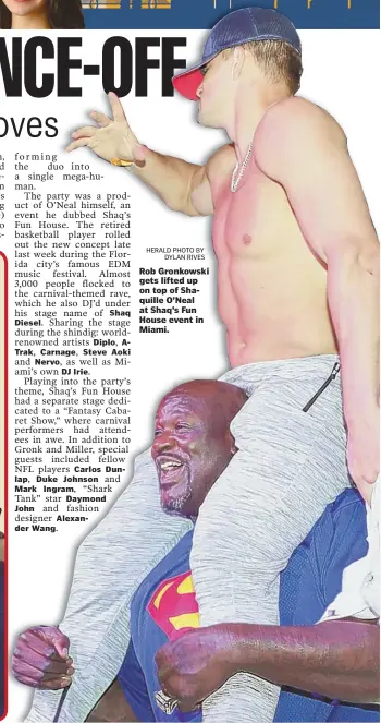  ?? HERALD PHOTO BY DYLAN RIVES ?? Rob Gronkowski gets lifted up on top of Shaquille O’Neal at Shaq’s Fun House event in Miami.