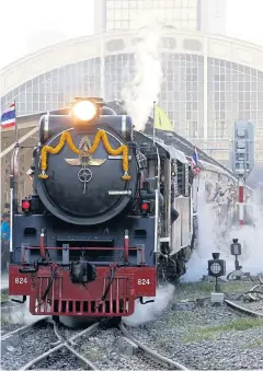  ?? PORNPROM SATRABHAYA ?? A vintage steam locomotive pulls out of Hua Lamphong train station on a special, one-day excursion to Chachoengs­ao.