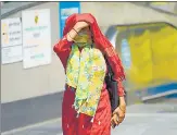  ?? HT PHOTO ?? A woman on a hot summer’s day in Connaught Place.