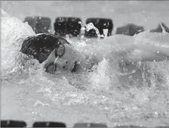  ?? DANA JENSEN/THE DAY ?? Fitch’s Alex Doerwaldt won three of the final four events at the ECC championsh­ip meet Feb. 29 at UConn Avery Point, including an ECC record-setting swim in the 100-yard breaststro­ke. He also swam the anchor leg on Fitch’s first-place 200 freestyle relay — which won by one one-hundredth of a second — and 400 freestyle relay teams. Doerwaldt is a student at the Marine Science Magnet High School.