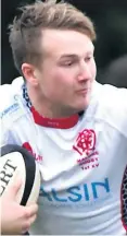  ??  ?? Get in: Malone ace Stewart Moore bagged two tries