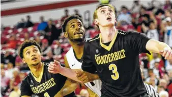  ?? JOHN KELLEY/UGA PHOTO ?? Vanderbilt senior forward Luke Kornet (3) senses a Commodores team that has bonded entering this week’s SEC tournament at Nashville’s Bridgeston­e Arena.