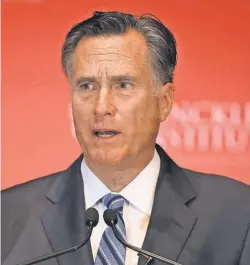  ?? TOMSMART, EUROPEAN PRESSPHOTO AGENCY ?? Mitt Romney says Donald Trump’s “promises are as worthless as a degree from Trump University.”