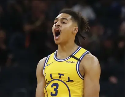  ?? (KARL MONDON/BAY AREA NEWS GROUP) ?? The Warriors’ Jordan Poole celebrates a three-point shot against the Indiana Pacers in January of 2020at Chase Center in San Francisco.