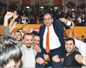  ?? ?? Faiz Sucuoğlu celebrates with jubilant supporters after becoming the UBP's leader last November