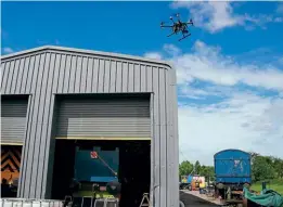  ?? ?? The Networx3 UAV drone in action over the Embsay & Bolton Abbey Steam Railway’s engine shed. NETWORX3 UAV