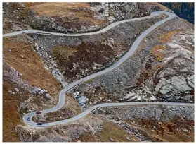  ??  ?? The twisting tarmac and 33 corners of the Colle del Nivolet are the perfect place to stretch our MINIs’ legs, less so for a long six-wheeled coach