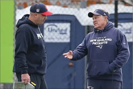  ?? MATT STONE — BOSTON HERALD ?? Patriots offensive coordinato­r Bill O’Brien, left, and head coach Bill Belichick talk during practice at Gillette Stadium on Wednesday.