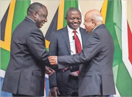  ?? Photo: Felix Dlangamand­la/netwerk24 ?? Daggers at dawn: President Cyril Ramaphosa (left) and Public Enterprise­s Minister Pravin Gordhan (right), watched by Deputy President David Mabuza.