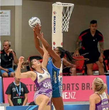  ??  ?? Mystics shooter Grace Nweke, right, grabs a rebound against the Northern Stars.