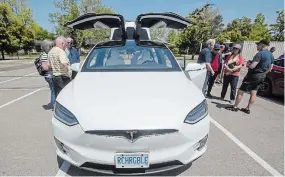  ?? BOB TYMCZYSZYN TORSTAR ?? CAA Niagara hosted its first electric vehicle showcase at The Pen Centre in St. Catharines. The free event featured an exhibitor fair, expert panel and EVs to take for a test drive.