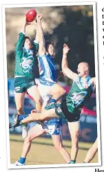  ?? Pictures: GLENN FERGUSON ?? TOP: Geelong Amateur players celebrate a goal late in the final term to give them the lead. ABOVE: Josh Westwood rises highest to take a nice grab.