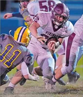  ?? SEAN D. ELLIOT/THE DAY ?? East Lyme’s Isaac Tomblin has rushed for over 100 yards in nine straight games, but that’s only part of his story. Did you know he plays a mean French horn, so good in fact he will perform with a national symphony?