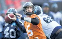  ?? NATAHN DENETTE/ THE CANADIAN PRESS ?? Toronto quarterbac­k Ricky Ray throws a pass during Friday practice ahead of the 105th Grey Cup against the Calgary Stampeders in Ottawa on Sunday.