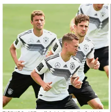  ??  ?? Hard at work:
(from left) Thomas Mueller, Joshua Kimmich and Leon Goretzka taking part in Germany’s training session at the Rungghof training centre in Italy yesterday. — AFP