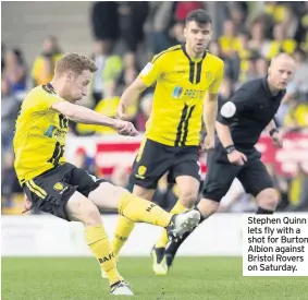  ??  ?? Stephen Quinn lets fly with a shot for Burton Albion against Bristol Rovers on Saturday.