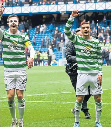  ?? ?? Callum Mcgregor leads his team-mates in a celebratio­n jig after their win in the last Old Firm league game at Ibrox