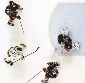  ?? THE ASSOCIATED PRESS ?? Nashville Predators center Colin Wilson scores against the Anaheim Ducks on Saturday during the second period of Game 5 in the Western Conference finals. The Predators won 3-1.