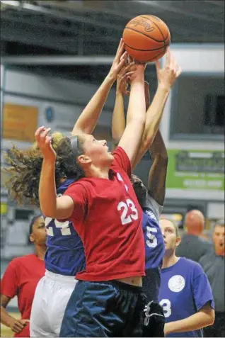  ?? GENE WALSH — DIGITAL FIRST MEDIA ?? Lafayette athlete, Natalie Kucowski, reaches for a rebound at women’s NCAA summer basketball league July 19, 2018.