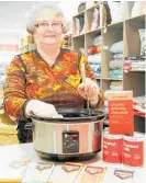  ?? ?? Trade Aid Napier manager Maureen Kennedy gets ready for some more chocolate tasting in store, a regular treat for shoppers formany years.