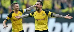  ?? AP ?? Dortmund’s Paco Alcacer (front) celebrates after he scored a goal Augsburg. —