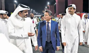  ??  ?? Poor judgment: Lord Coe (centre), president of the IAAF, at the world championsh­ips in Doha, which have been heavily criticised