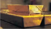  ?? STEFAN WERMUTH/BLOOMBERG NEWS ?? Some anticipate­d investor fears would push gold higher as they flocked to safer assets. Instead, the metal’s value languished.