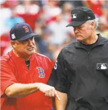  ?? Maddie Meyer / Getty Images ?? John Farrell (left) was ejected from Game 4 of the ALDS on Monday. It turned out to be his last game as Red Sox manager.