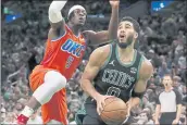  ?? MICHAEL DWYER — THE ASSOCIATED PRESS ?? The Celtics’ Jayson Tatum, who had 33 points, drives against the Oklahoma City Thunder’s Luguentz Dort.