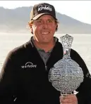  ??  ?? Special place: Phil Mickelson savours victory