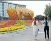  ?? Picture: GETTY IMAGES ?? BRIGHT FUTURE: The ‘Golden Bridge on Silk Road’ welcoming structure at Beijing’s Olympic Park ahead of the Belt and Road Forum for Internatio­nal Cooperatio­n which starts on Sunday