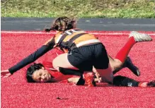  ?? ?? This King's-Edgehill Highlander was in for a rough landing when she scored against Park View on April 7.