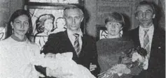  ??  ?? Putin holds his daughter, Maria, alongside his wife Lyudmila, centre, in 1985. They were joined by Roldugin and his wife, Ira, the girl’s godparents.