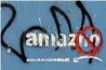  ?? Reuters ?? Here’s one way those opposed to Amazon’s plans are using to voice their displeasur­e: graffiti ridiculing the firm. —