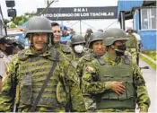  ?? DOLORES OCHOA AP ?? Soldiers guard the perimeter of Bella Vista prison where a riot broke out in Santo Domingo, Ecuador.