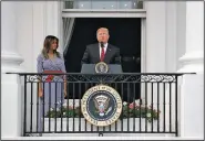  ?? AP/ALEX BRANDON ?? President Donald Trump, with first lady Melania Trump at his side, addresses military families attending a July 4 picnic Wednesday on the White House grounds.