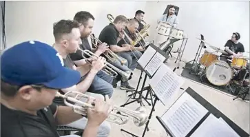  ?? Kirk McKoy Los Angeles Times ?? MUSICIANS prep for “Sonorama!,” Saturday’s concert at the Getty that launches “Musical Interventi­ons.”