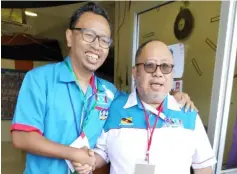  ??  ?? Iswardy (left) poses with Baharuddin during the PKR election.