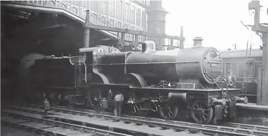  ??  ?? The Fowler LMS Compounds were not only used between Leeds and Carlisle but also allocated to Scottish area sheds such as Polmadie, where they were disliked for being under powered, but when used on the services to the Ayr coast from Carlisle they did much good work. Another of the North British Locomotive Cobuilt examples, the well turned out No 1145 was seen by Norman Hindle at Carlisle having arrived with a local service from Glasgow (Central) via Beattock in April 1930. NBL Works No 23239, this 4-4-0 entered traffic in July 1925 and was withdrawn in October 1953 from Carstairs shed. The plates ahead of the bogie wheels were needed when doublehead­ing to prevent water from troughs entering the bearings.