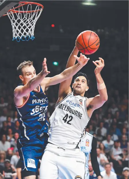  ?? Picture: GETTY IMAGES ?? Adelaide’s Anthony Drmic battles Melbourne’s Tai Wesley of Melbourne United on Sunday.